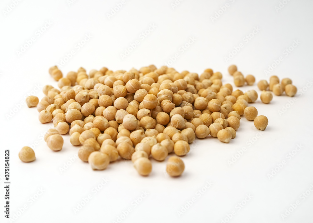 Chickpeas. A handful of chickpea isolated on a white background. Chickpeas. A handful of chickpea isolated on a white background.