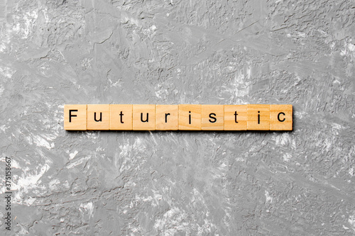 Futuristic word written on wood block. Futuristic text on cement table for your desing, concept