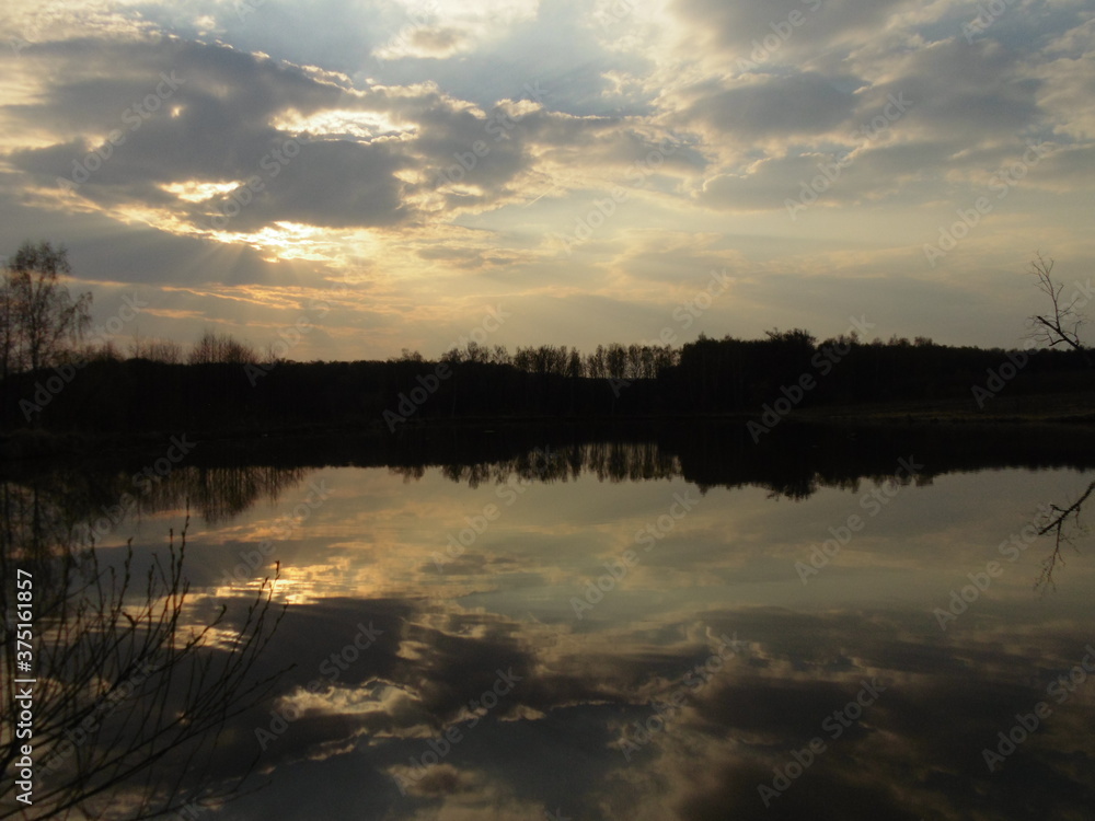 Fototapeta premium sunset over the lake
