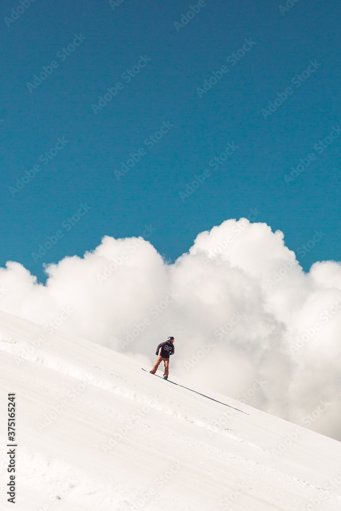 Snowboarder in the clouds