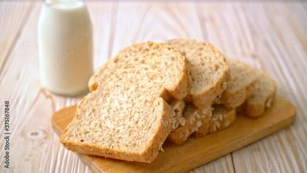 sliced wholegrain bread on a wooden table sliced wholegrain bread on a wooden table