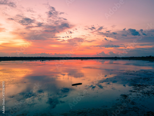 sunset over the lake © Thodsapol