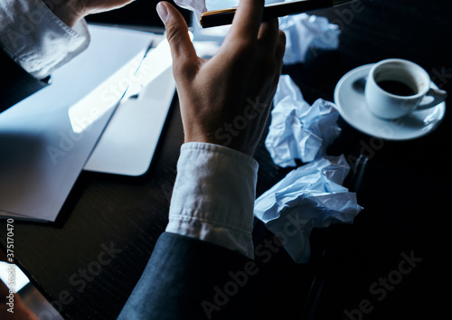 Cafe papers on the table crumpled paper coffee cup executive businesswoman lifestyle