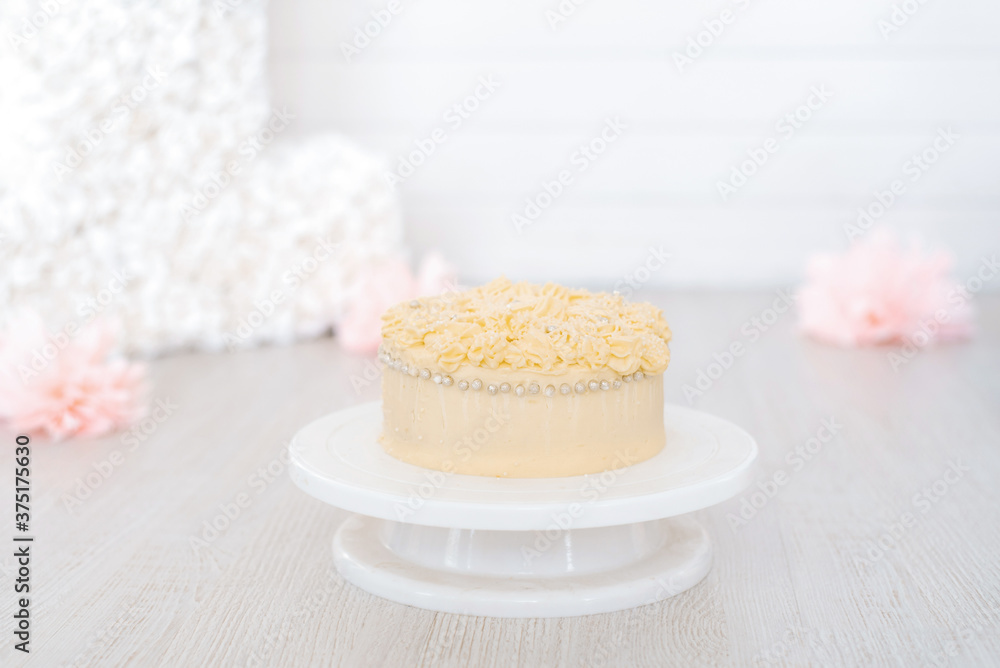 Sweet delicious cake for birthday or holiday, decorated with cream