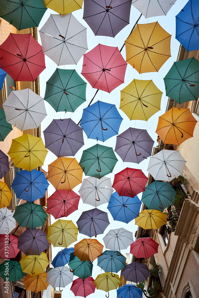 colorful umbrellas adorn the streets