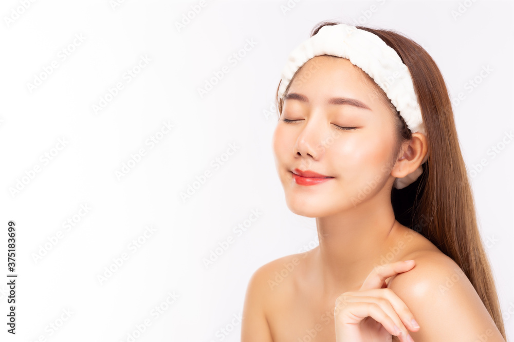 Attractive beautiful young asian woman close eyes with happy and smile face. Charming beautiful young female has beauty facial skin. beauty skin care, spa concept with white background, copy space Attractive beautiful young asian woman close eyes with happy and smile face. Charming beautiful young female has beauty facial skin. beauty skin care, spa concept with white background, copy space