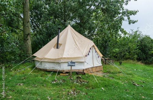 A fabric bell tent in the woods