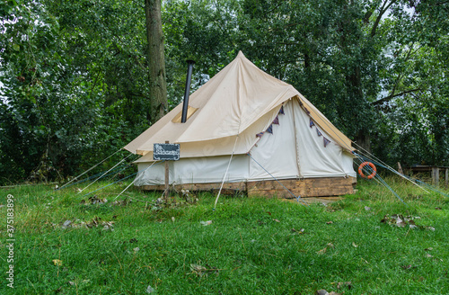 A fabric bell tent in the woods