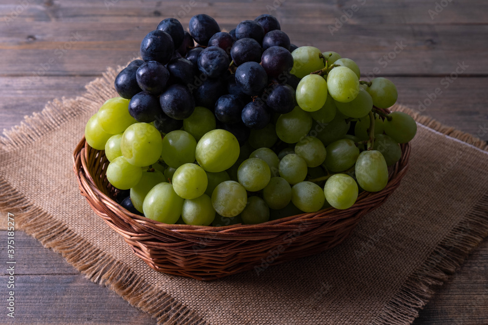 harvested ripe juicy grapes in a basket harvested ripe juicy grapes in a basket