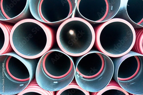 front view of a stack of metal pipes