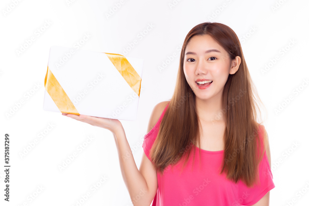 Asian young woman holding gift box with smile face. Pretty girl get birthday New year or Christmas present with happiness. Beautiful female get surprised when receive gifts, white background Asian young woman holding gift box with smile face. Pretty girl get birthday New year or Christmas present with happiness. Beautiful female get surprised when receive gifts, white background