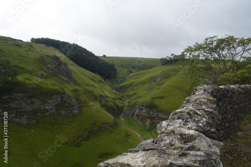 Scenic views of the Peak District at Cave Dale, Castleton photo