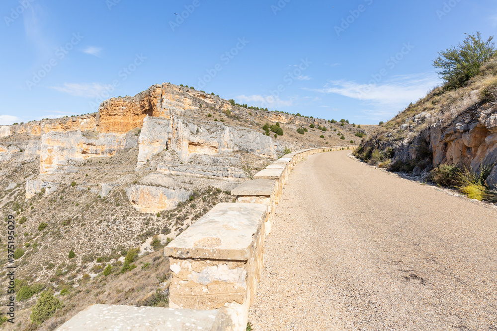 a paved road at Hoces del Rio Riaza Natural Park, Maderuelo, province of Segovia, Castile and Leon, Spain