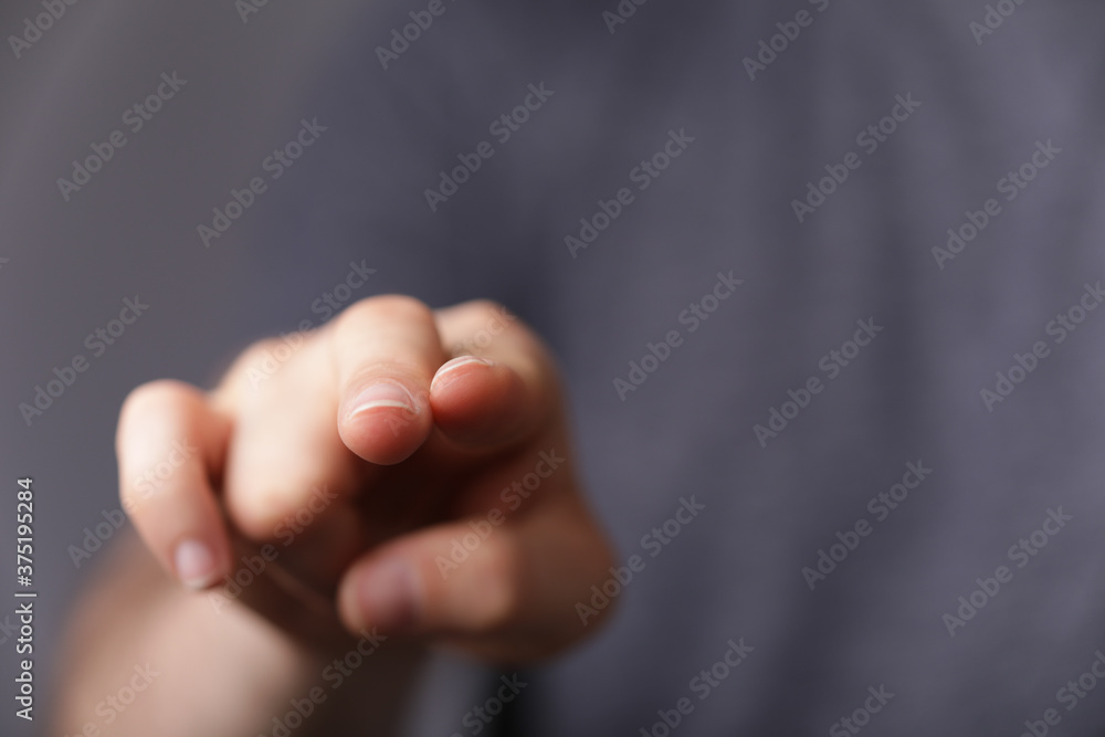 Obraz premium A man hand touching virtual screen, modern background concept , can put your text at the finger, copy space.