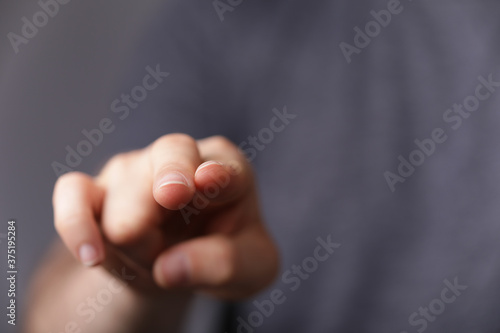 A man hand touching virtual screen, modern background concept , can put your text at the finger, copy space. © vegefox.com