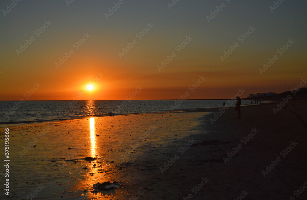
Red sunset on the beach of Punta Candor, Rota Costa de la Luz Cadiz, Spain