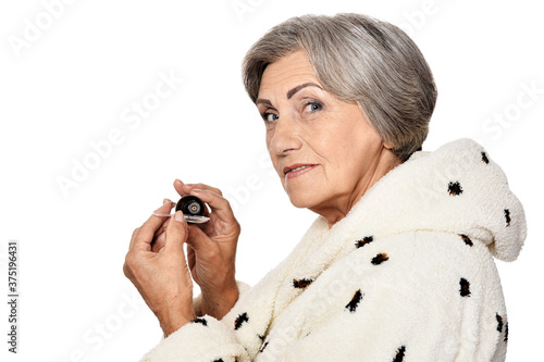 Ill beautiful senior woman on white background