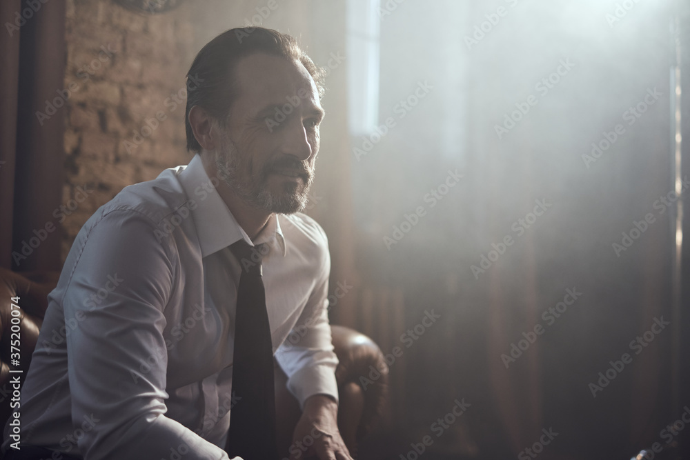 cinematic photo shoot of the confident actor celebrity look in foggy loft room