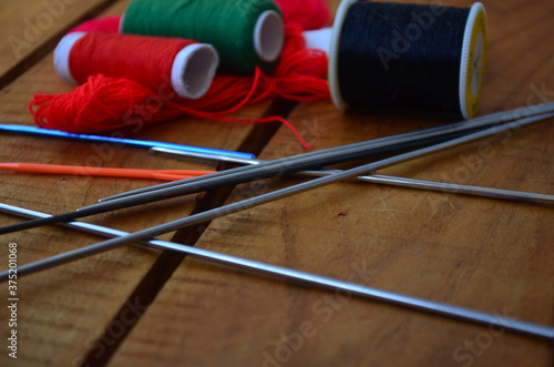 Threads, scissors, knitting needles, hook. Everything for handmade.