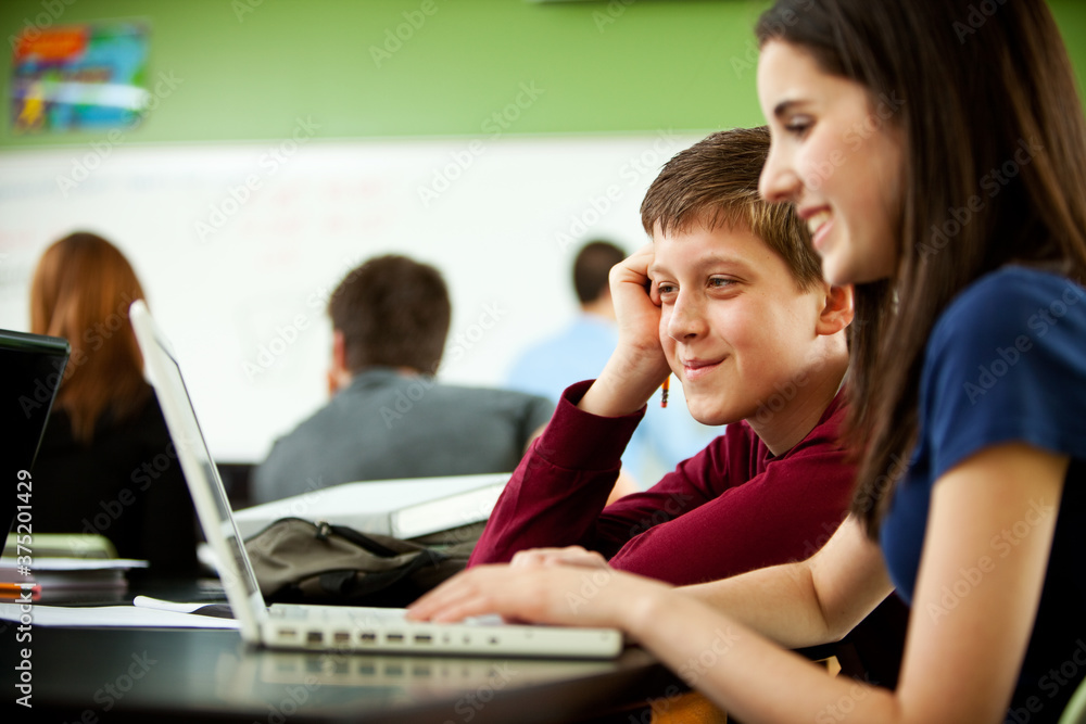 High School: Focus on Teen Boy Helping on Project High School: Focus on Teen Boy Helping on Project
