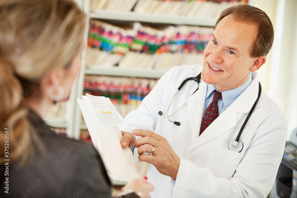 Waiting Room: Doctor Discussing Medicine Waiting Room: Doctor Discussing Medicine