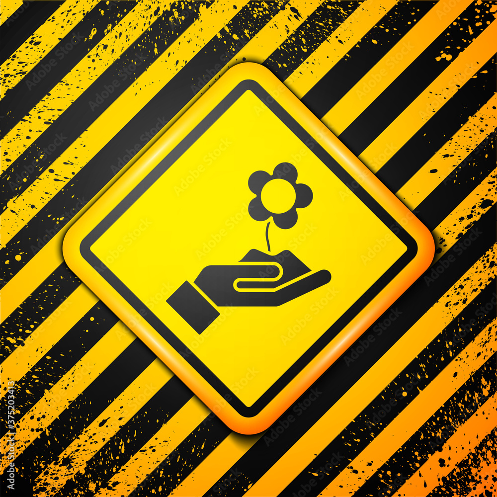 Black Hand holding flower icon isolated on yellow background. Seed and seedling. Planting sapling. Ecology concept. Warning sign. Vector Illustration. Black Hand holding flower icon isolated on yellow background. Seed and seedling. Planting sapling. Ecology concept. Warning sign. Vector Illustration.
