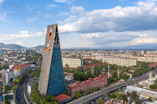 Espectacular vista aérea del Conjunto Habitacional Nonoalco Tlatelolco al norte de la Ciudad de México con un cielo azul como fondo photo