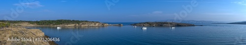 Panorama picture of Ciganka bay on the island of Rab in Croatia in the morning after sunrise. photo