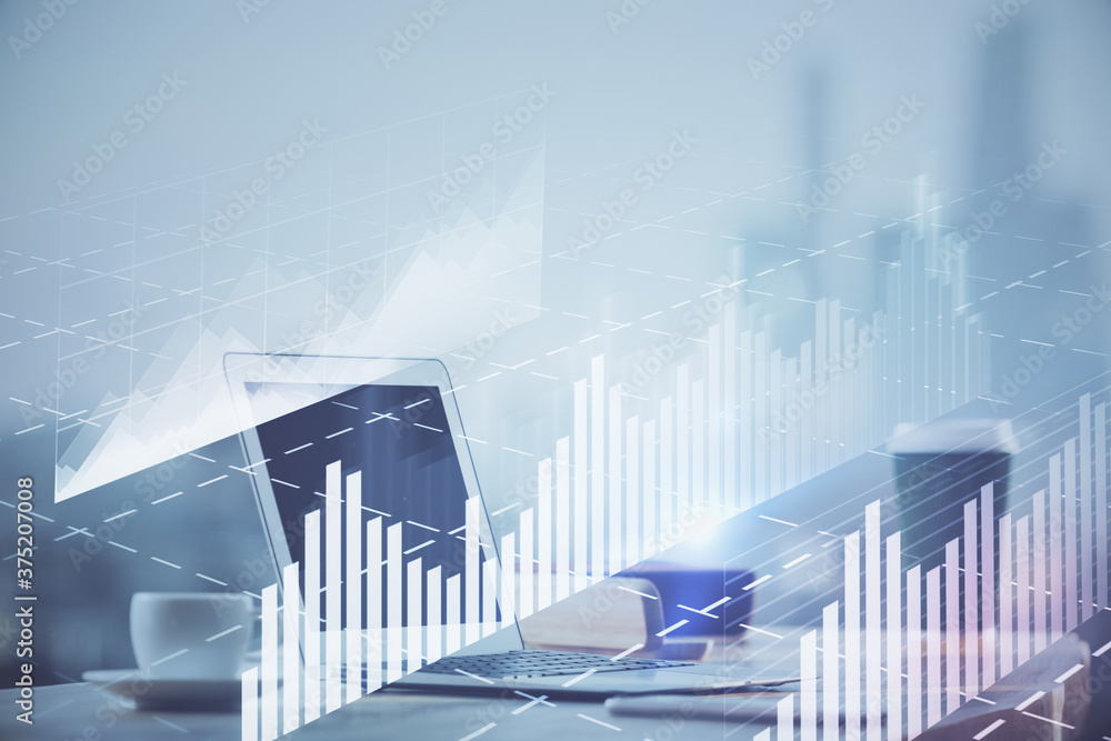 Forex graph hologram on table with computer background. Multi exposure. Concept of financial markets. Forex graph hologram on table with computer background. Multi exposure. Concept of financial markets.
