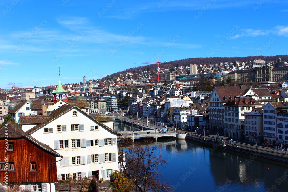 Fototapeta premium Zurich Switzerland houses with river and blue sky