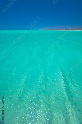 Tropical blue beach photo