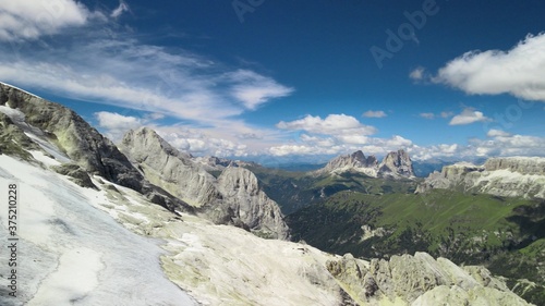 Amazing aerial view of Marmolada Glacier from drone  Dolomite Mountains  Italy