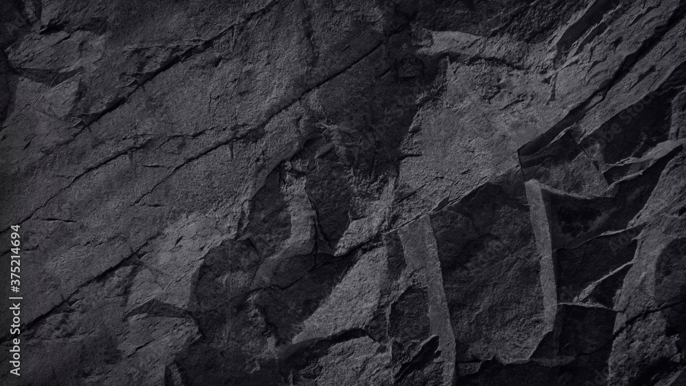 Black and white background. Stone background. Rock texture. Mountains surface. Close-up. Stone wall background.