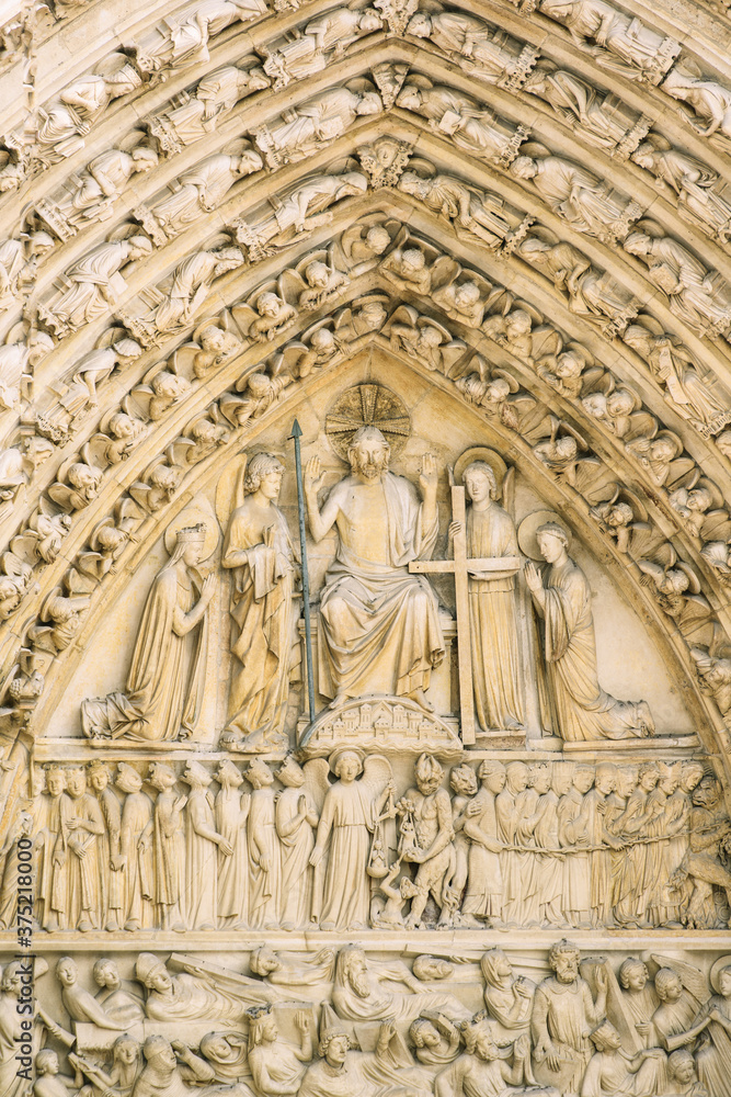 Closeup view of sculptures at the Notre Dame church in Paris Closeup view of sculptures at the Notre Dame church in Paris
