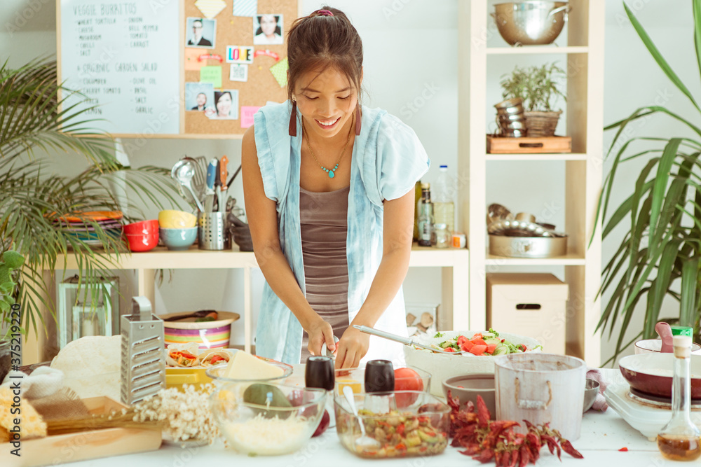 Smiling Woman Making Tacos Smiling Woman Making Tacos