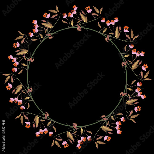 Round floral frame with autumn branches of spindle tree. Seasonal wreath with fall leaves and berries. Euonymus plant.