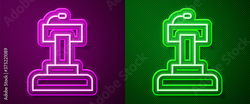 Glowing neon line Stage stand or debate podium rostrum icon isolated on purple and green background. Conference speech tribune. Vector.