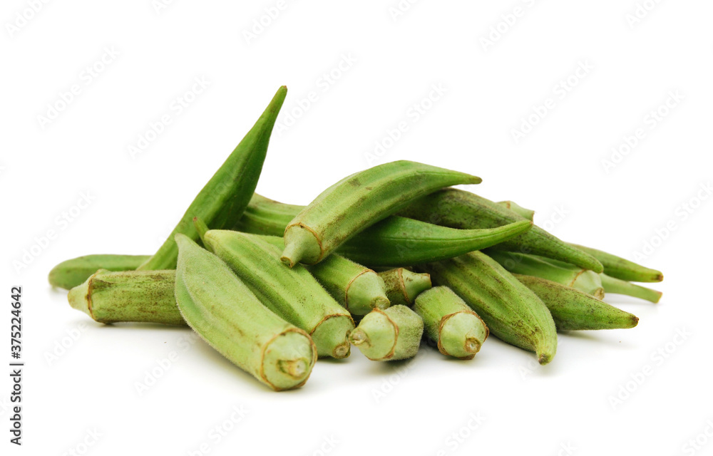 Fresh raw okra isolated on white background, horizontal with copy space Fresh raw okra isolated on white background, horizontal with copy space
