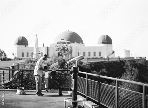 father and son at the observatory photo