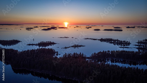 Slika na platnu Sunset in Kvarken archipelago Unesco world heritage site, Finland