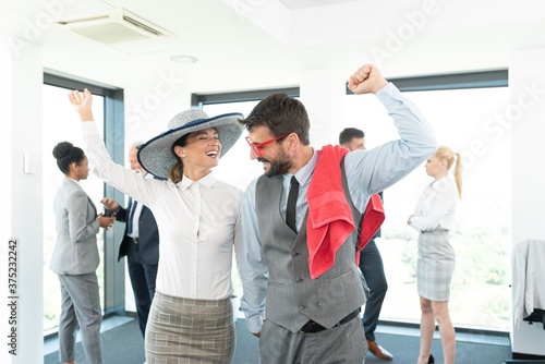 Joyful colleagues having fun on business trip vacation