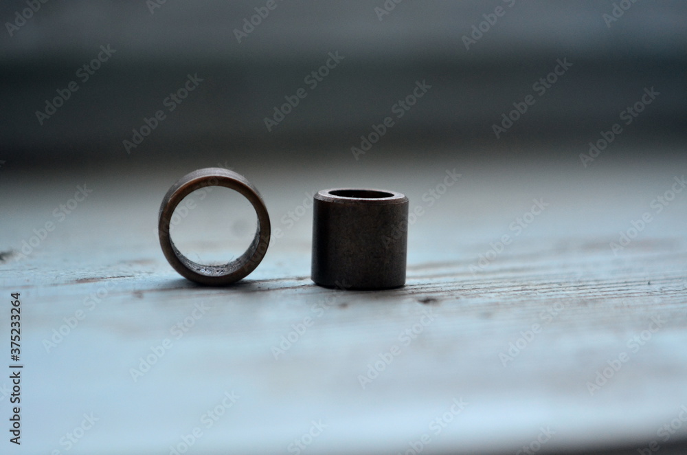 Photo of two brass starter bushing Photo of two brass starter bushing