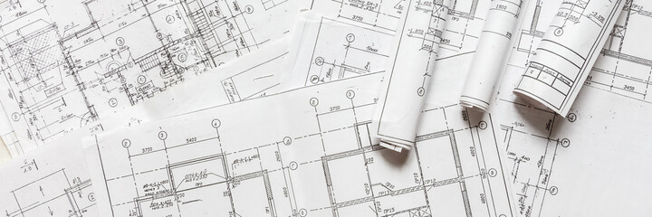 architect design working drawing sketch plans blueprints and making architectural construction model in architect studio,flat lay.
