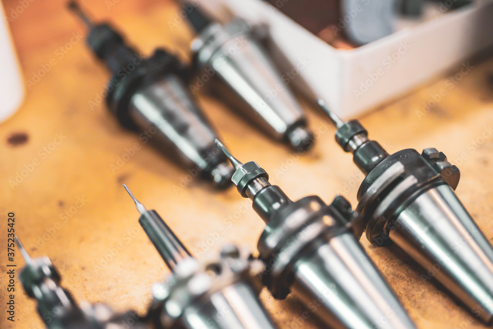 CNC Fräser für die Fräsmaschine in der Industrie Photos | Adobe Stock