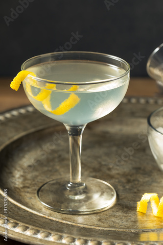 Refreshing Dry Martini with a Lemon Garnish