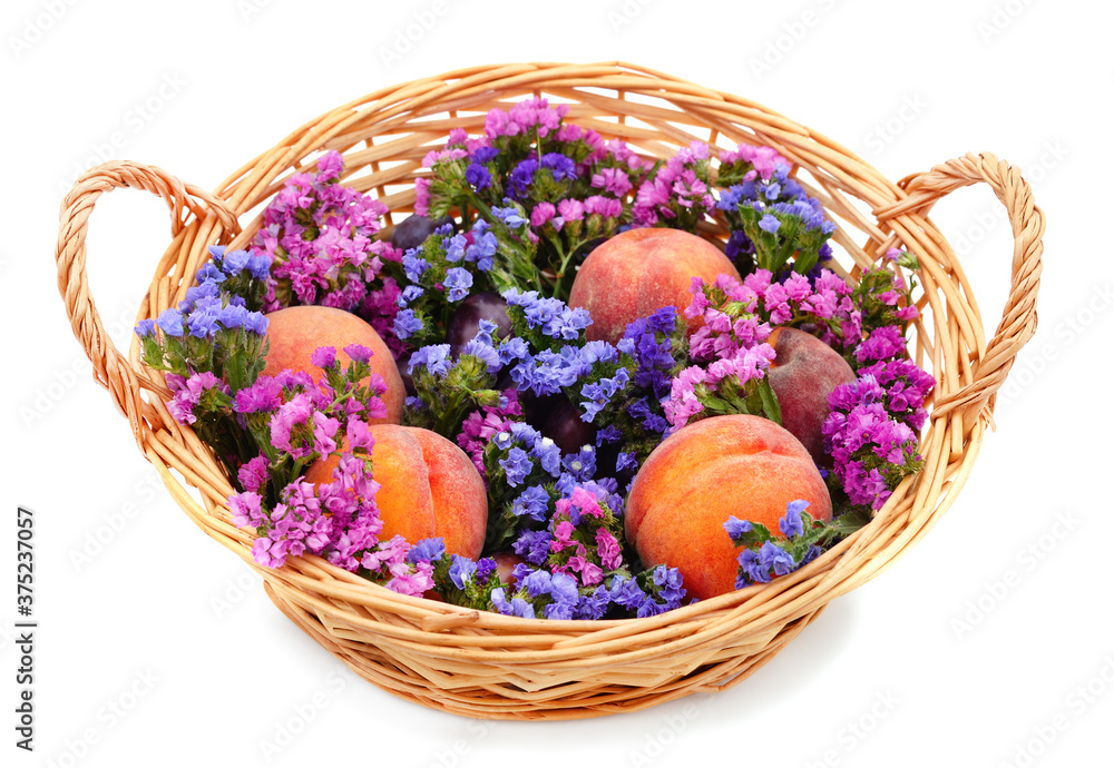 Basket with peaches and statice.