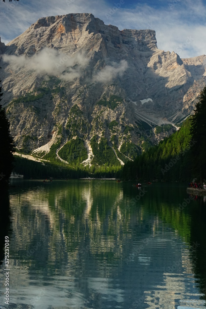Perfect reflection on Lago di Braies on a summer morning, Dolomites, Unesco, Sudtirol, Trentino Alto Adige, Italy