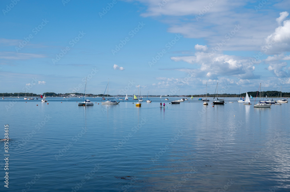 Serene and Peaceful Harbour of Emsworth on a still and warm summers day with boats and yachts at anchor. Serene and Peaceful Harbour of Emsworth on a still and warm summers day with boats and yachts at anchor.