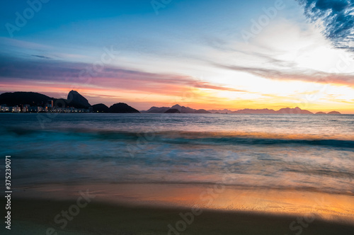 Sunrise at Copacabana beach in Rio de Janeiro.