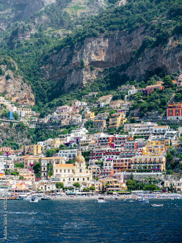Colorful cityscape of Positano looking from sea